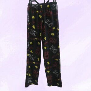 Home Alone Men's Christmas Home Alone pj pajama bottoms in black, red and yellow